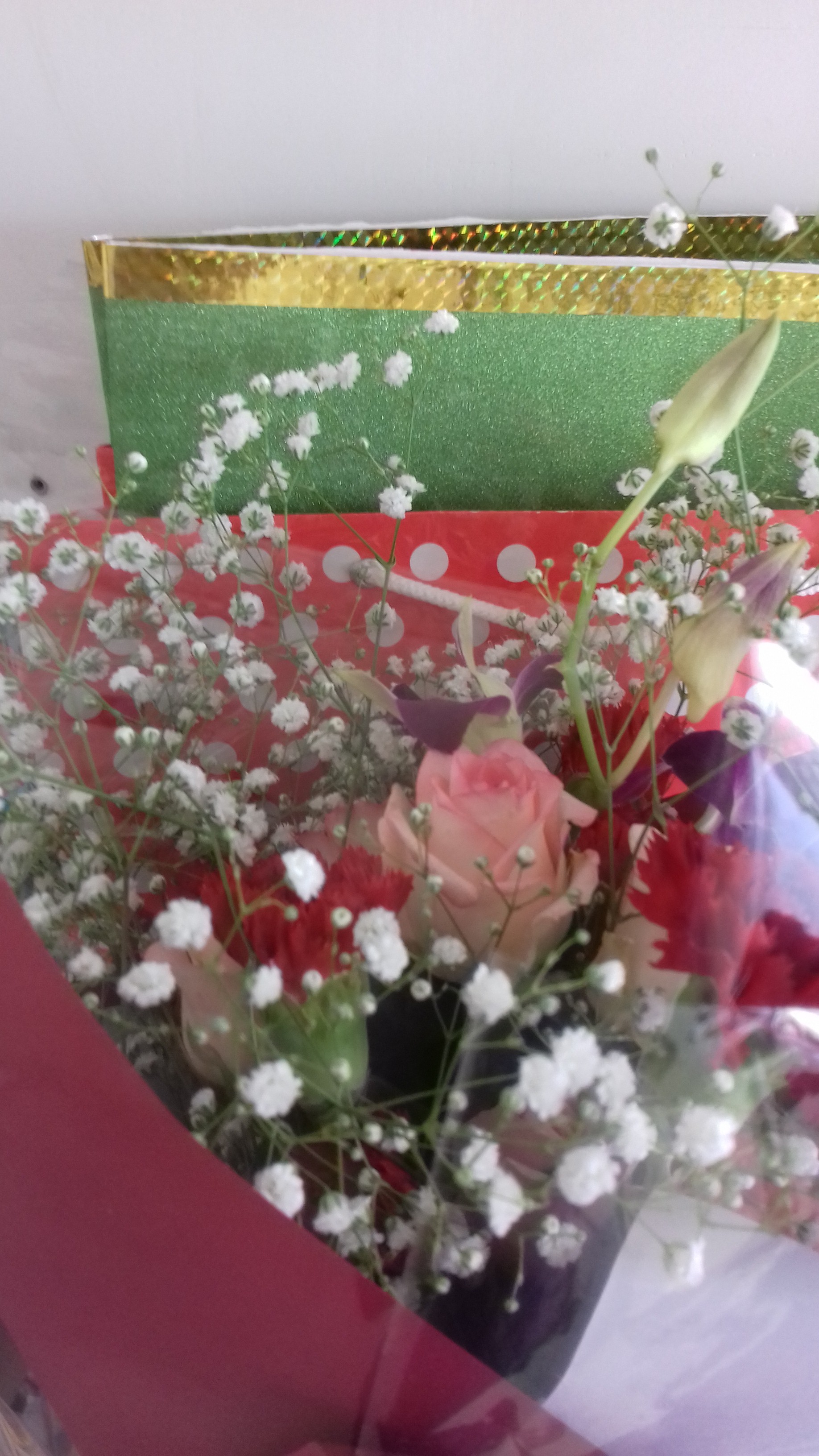 Mixed Roses & Orchid with seasonal fillers